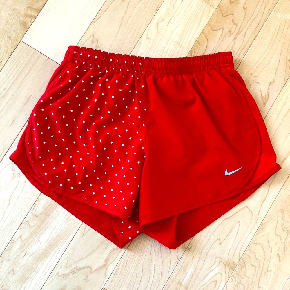 Red Nike shorts